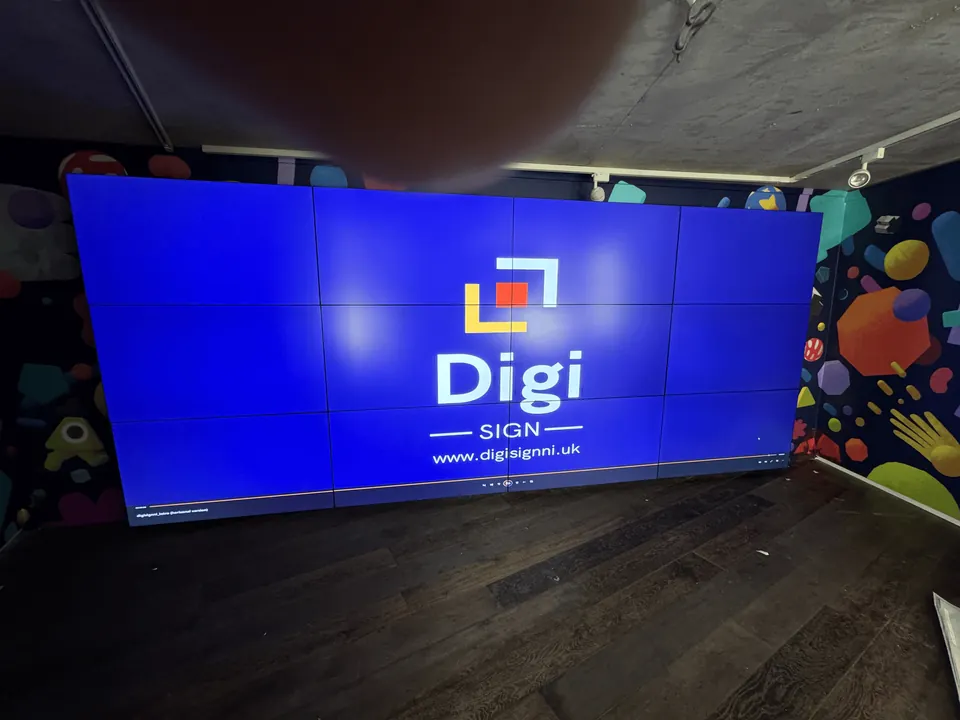 LCD video wall displaying Digi Sign content during commissioning at The MAC in Belfast