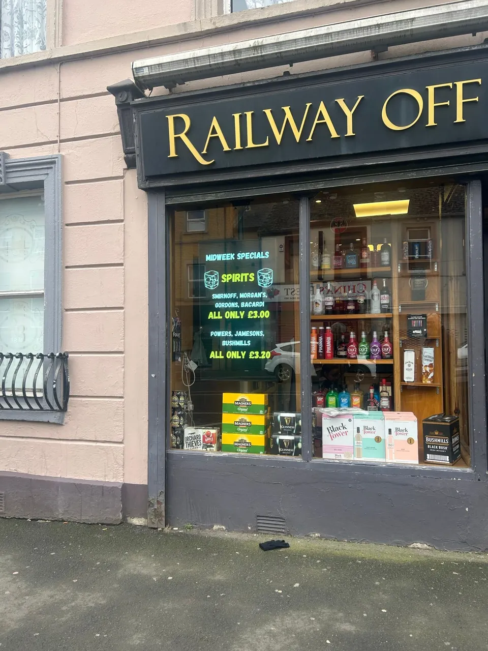 High-brightness window display at Railway Off Licence in Portadown
