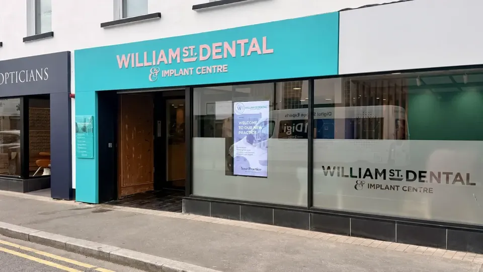 Closer view of the William Street Dental window screen and practice frontage