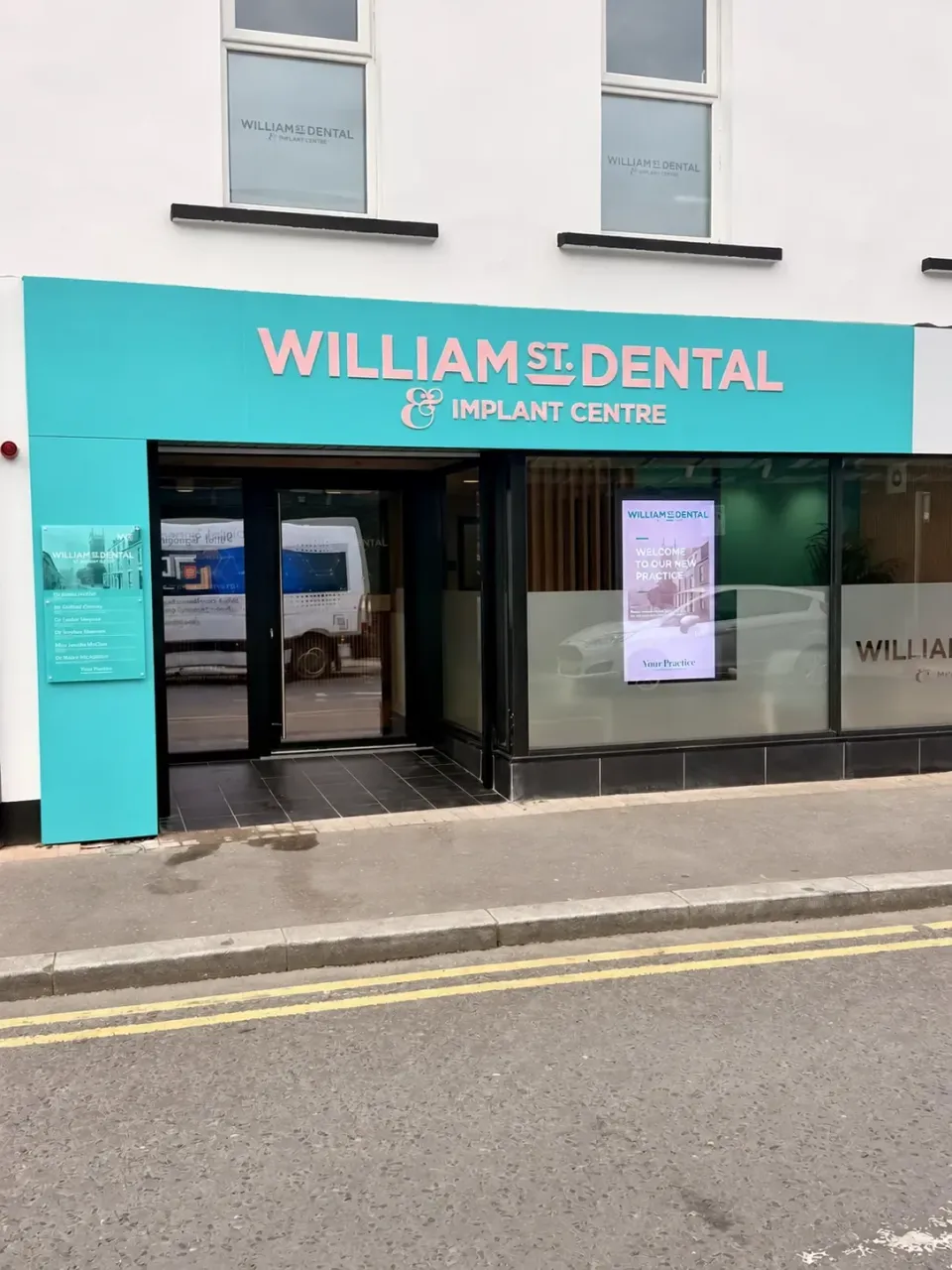 William Street Dental entrance and window display viewed from across the street